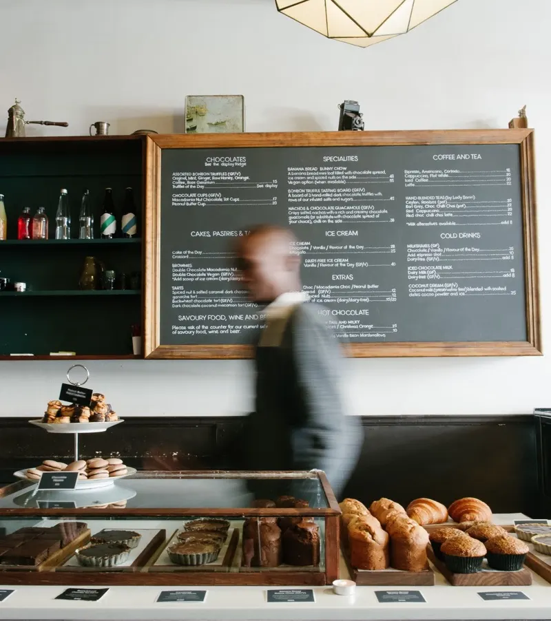 A small café with a chalkboard menu